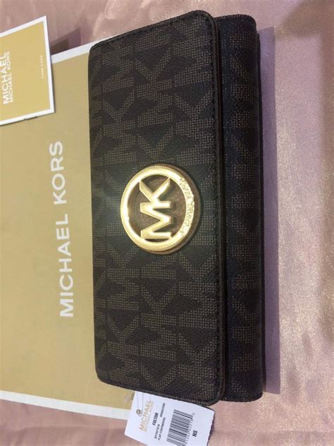 Michael Kors Signature PVC Fulton Flap Wallet 